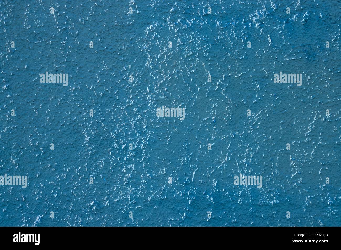 Light blue colored abstract wall background with textures of different shades of blue Stock Photo