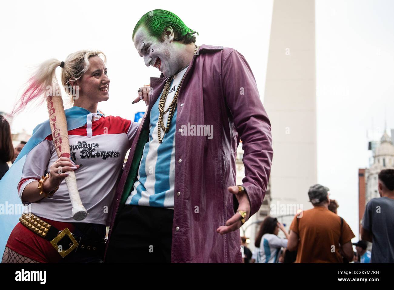 Buenos Aires, Argentina. 30th Nov, 2022. Argentina soccer fans dressed up as Joker and Harley Quinn celebrate their team's winning match against Poland at the World Cup, at Obelisk in Buenos Aires. Argentina struck two second-half goals to beat Poland and secure first place in Group C, with the Poles pipping Mexico by goal difference. Credit: SOPA Images Limited/Alamy Live News Stock Photo
