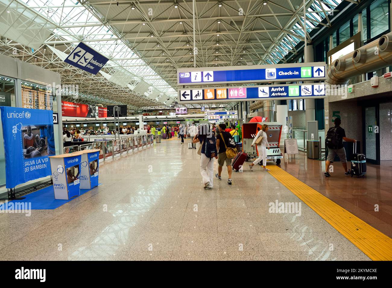 ROME, ITALY - AUGUST 16, 2015: Fiumicino Airport interior. Fiumicino - Leonardo da Vinci International Airport is a major international airport in Rom Stock Photo