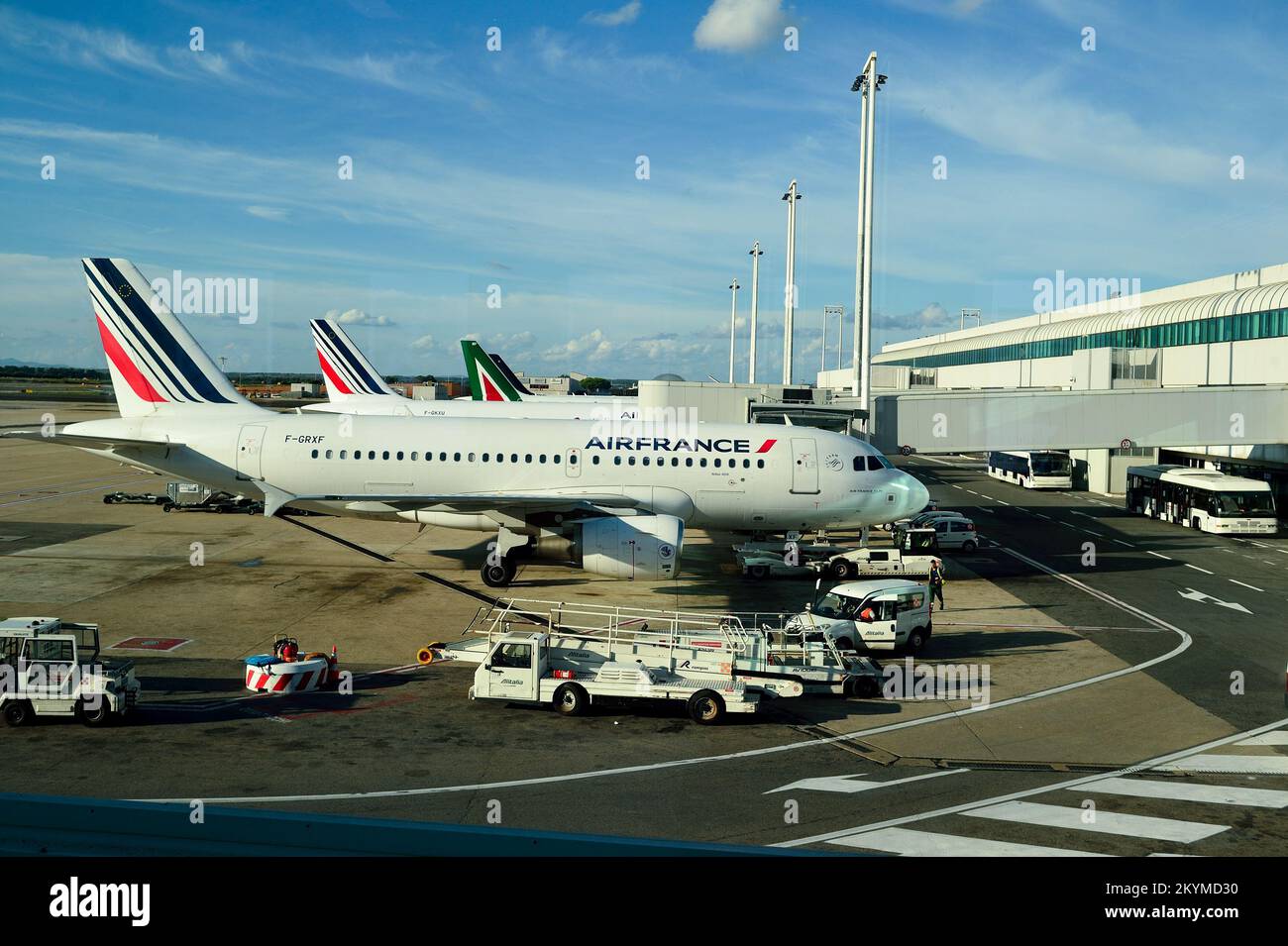 Airplane To Rome ROME, ITALY - AUGUST 16, 2015: docked jet aircraft in Fiumicino Airport ...