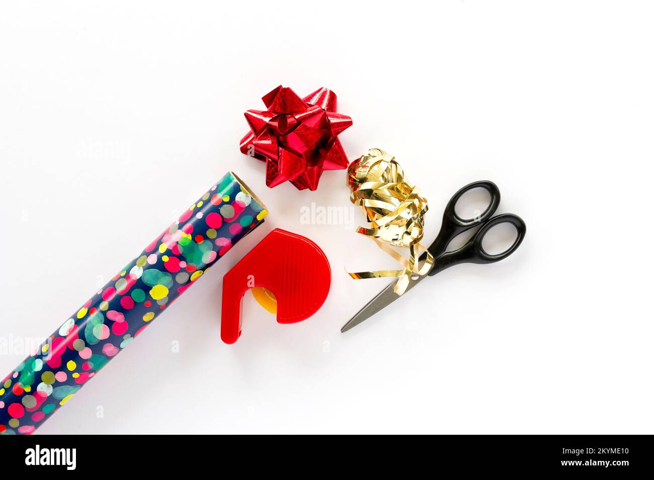 Grifwrapping paper, scissors, sticky tape and decorations Stock Photo
