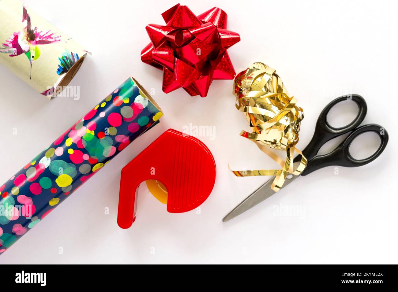 Wrapping paper, adhesive tape and scissors Stock Photo - Alamy