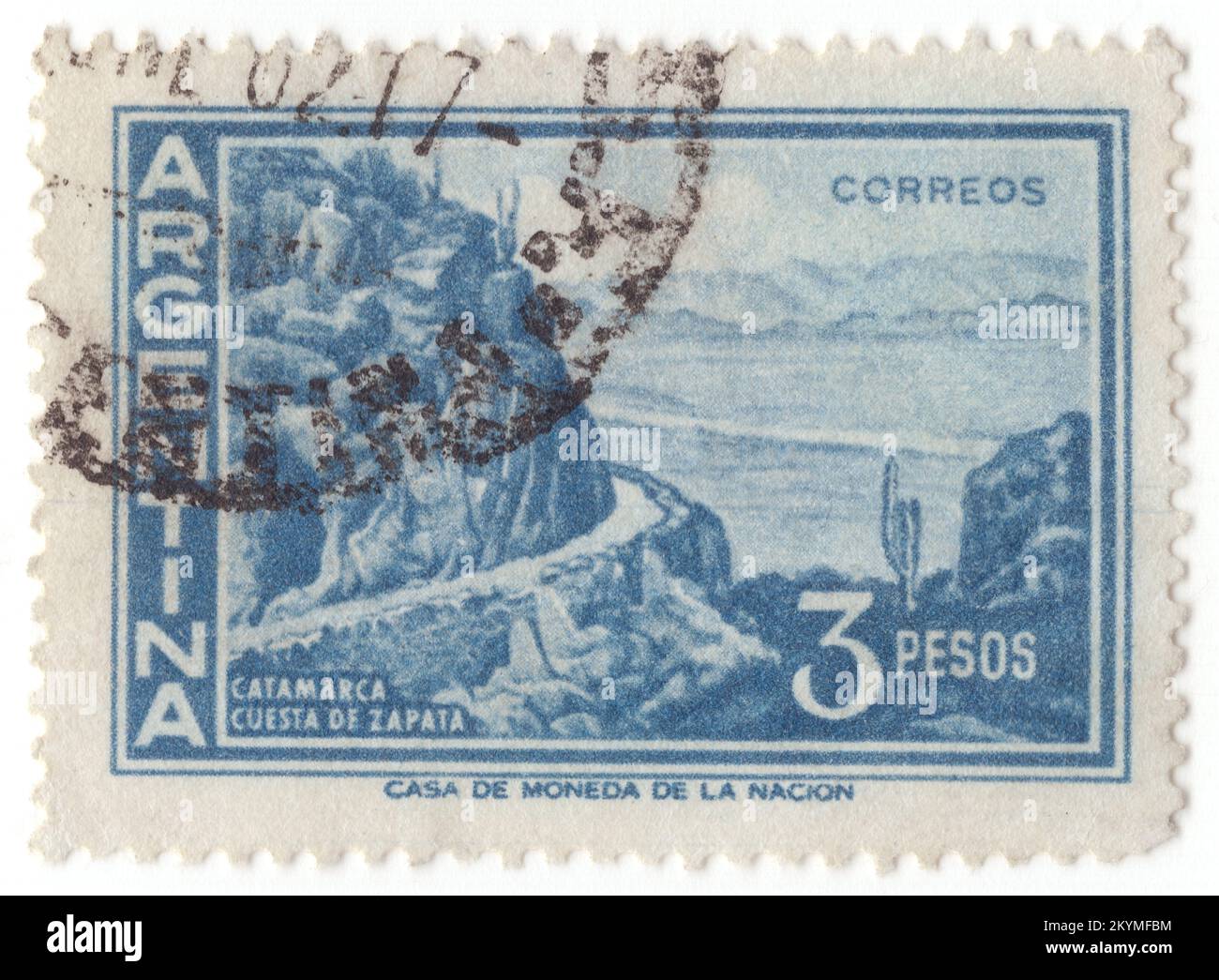 ARGENTINA - 1960: 3 pesos dark blue postage stamp depicting Zapata Slope, Catamarca. Catamarca is a province of Argentina, located in the northwest of the country. Its literacy rate is 95,5%. Neighbouring provinces are (clockwise, from the north): Salta, Tucuman, Santiago del Estero, Cardoba, and La Rioja. To the west it borders the country of Chile. The capital is San Fernando del Valle de Catamarca, usually shortened to Catamarca. Other important cities include Andalgalá, Tinogasta, and Belen. Most of Catamarca's territory is covered by mountains (80%) Stock Photo