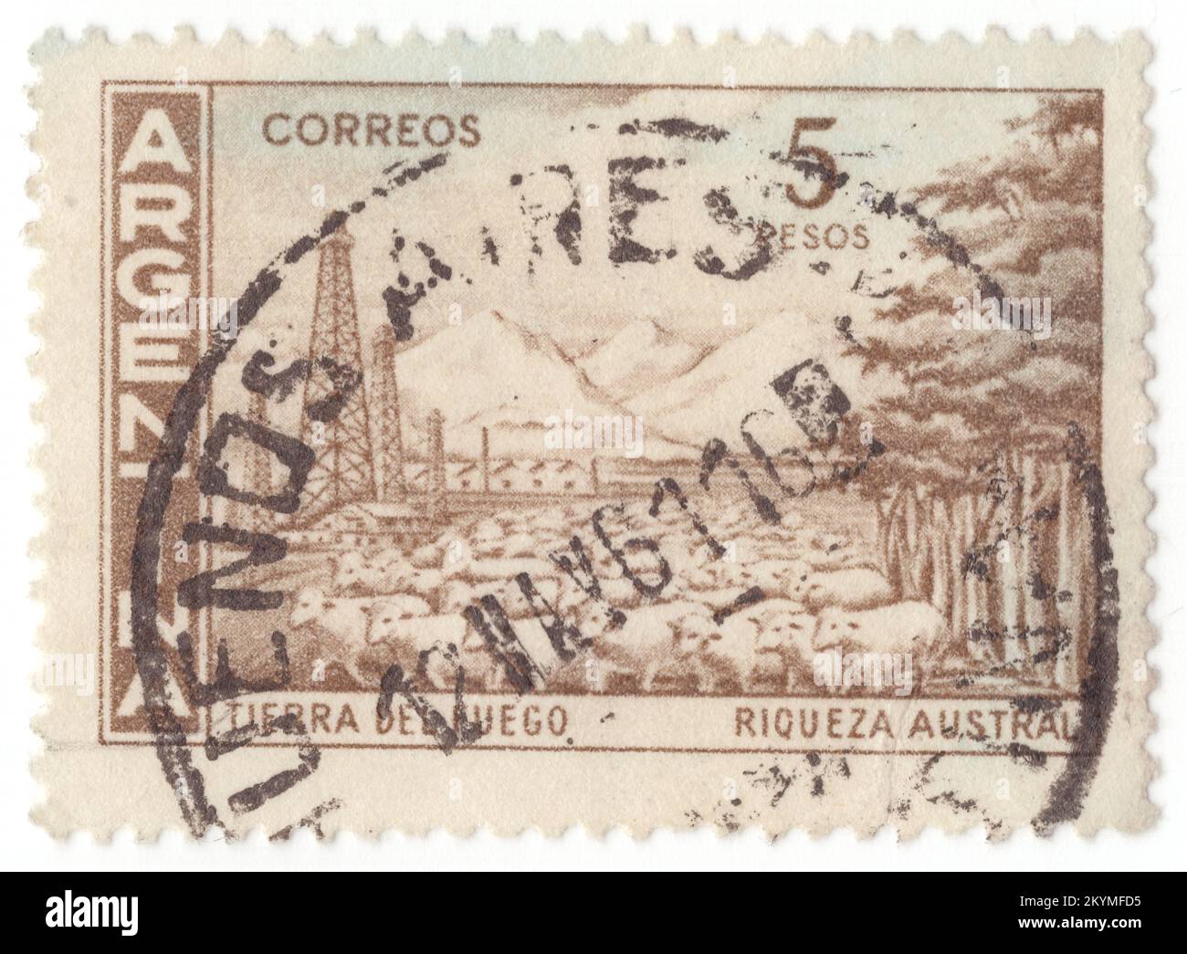 ARGENTINA - 1959: 5 pesos gray-brown postage stamp depicting Tierra del Fuego ('Land of Fire'), officially the Province of Tierra del Fuego, Antarctica and South Atlantic Islands, is the southernmost, smallest, and least populous Argentine province. The territory of the current province had been inhabited by indigenous people for more than 12,000 years, since they migrated south of the mainland. It was first encountered by a European in 1520 when spotted by Ferdinand Magellan Stock Photo