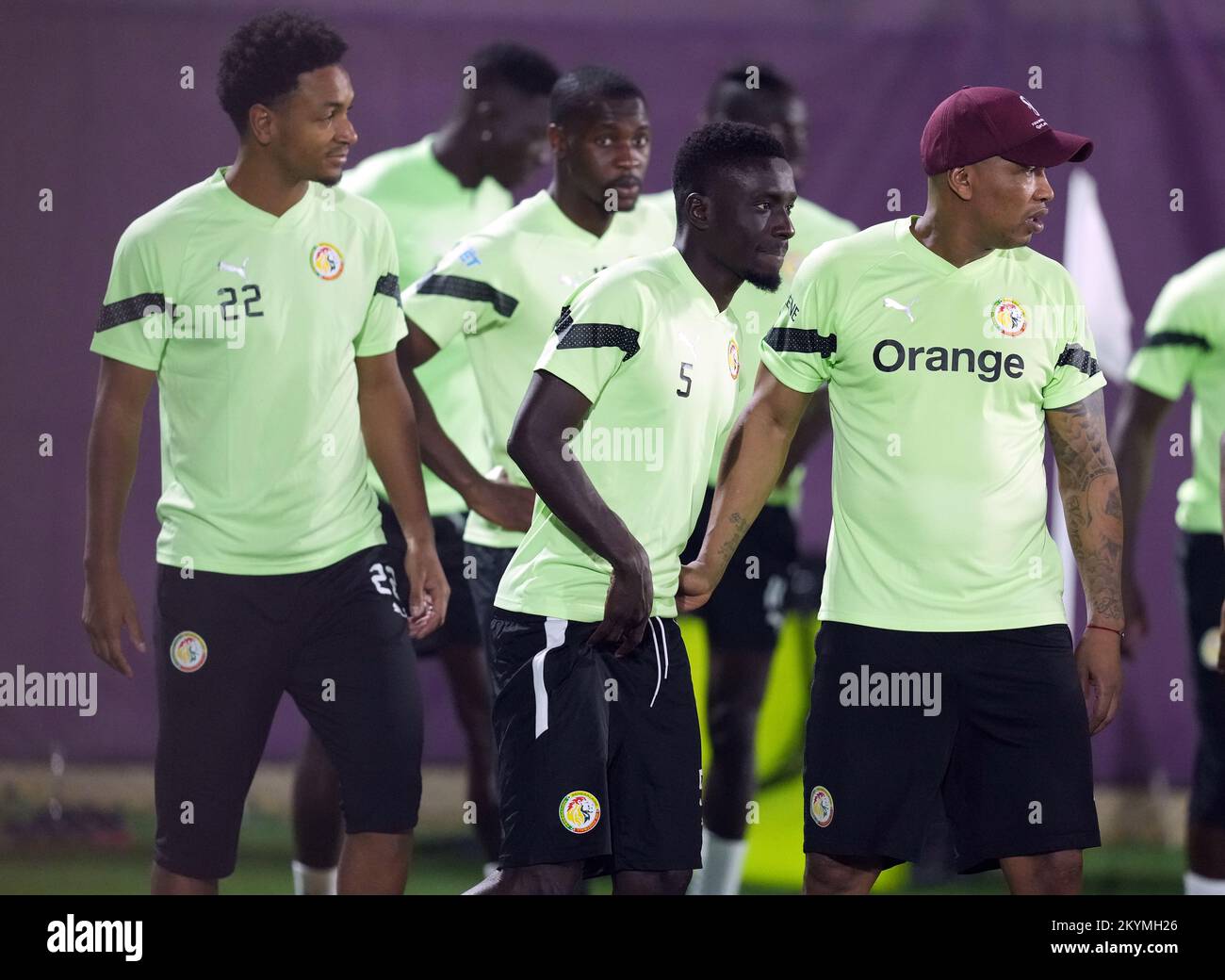 Senegal's Idrissa Gueye (centre) with El Hadji Diouf during a training session Al Duhail SC, Doha, Qatar. Picture date: Thursday December 1, 2022. Stock Photo