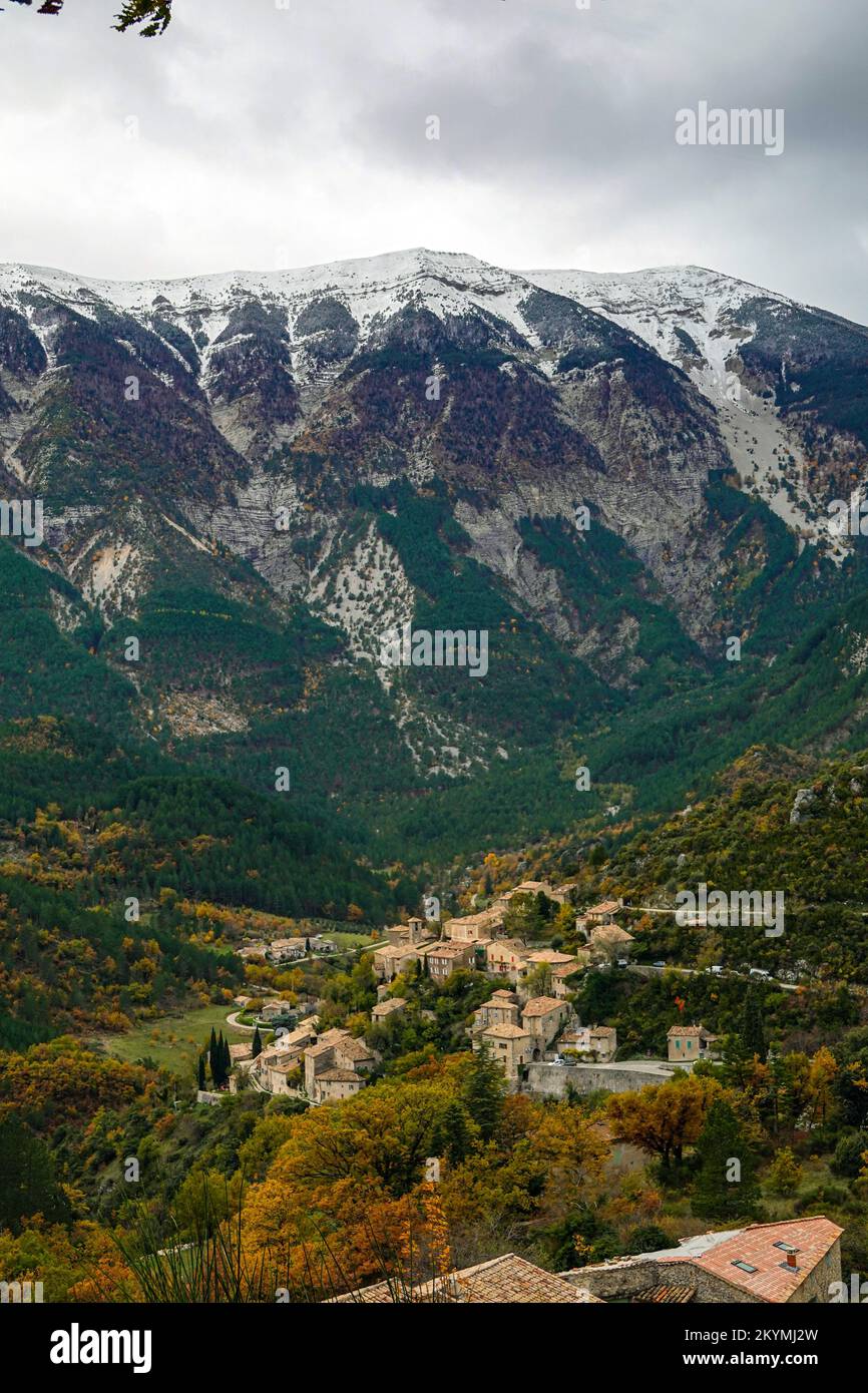 Autumn in Provence with the small village of Brantes, and a snowy Mont Ventoux behind Stock Photo