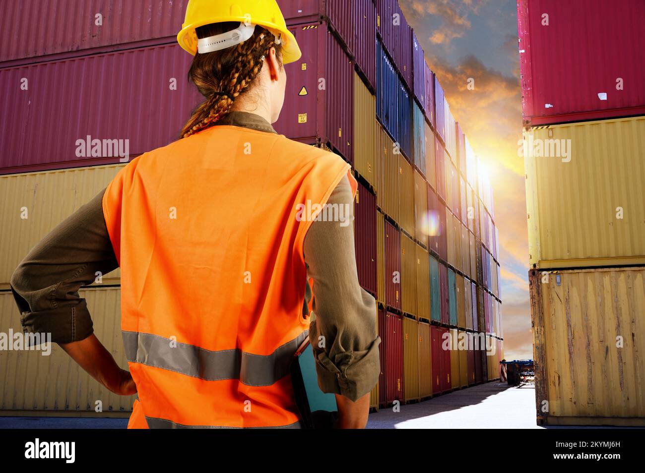 Woman works as a warehouse worker in a cargo warehouse Stock Photo Alamy