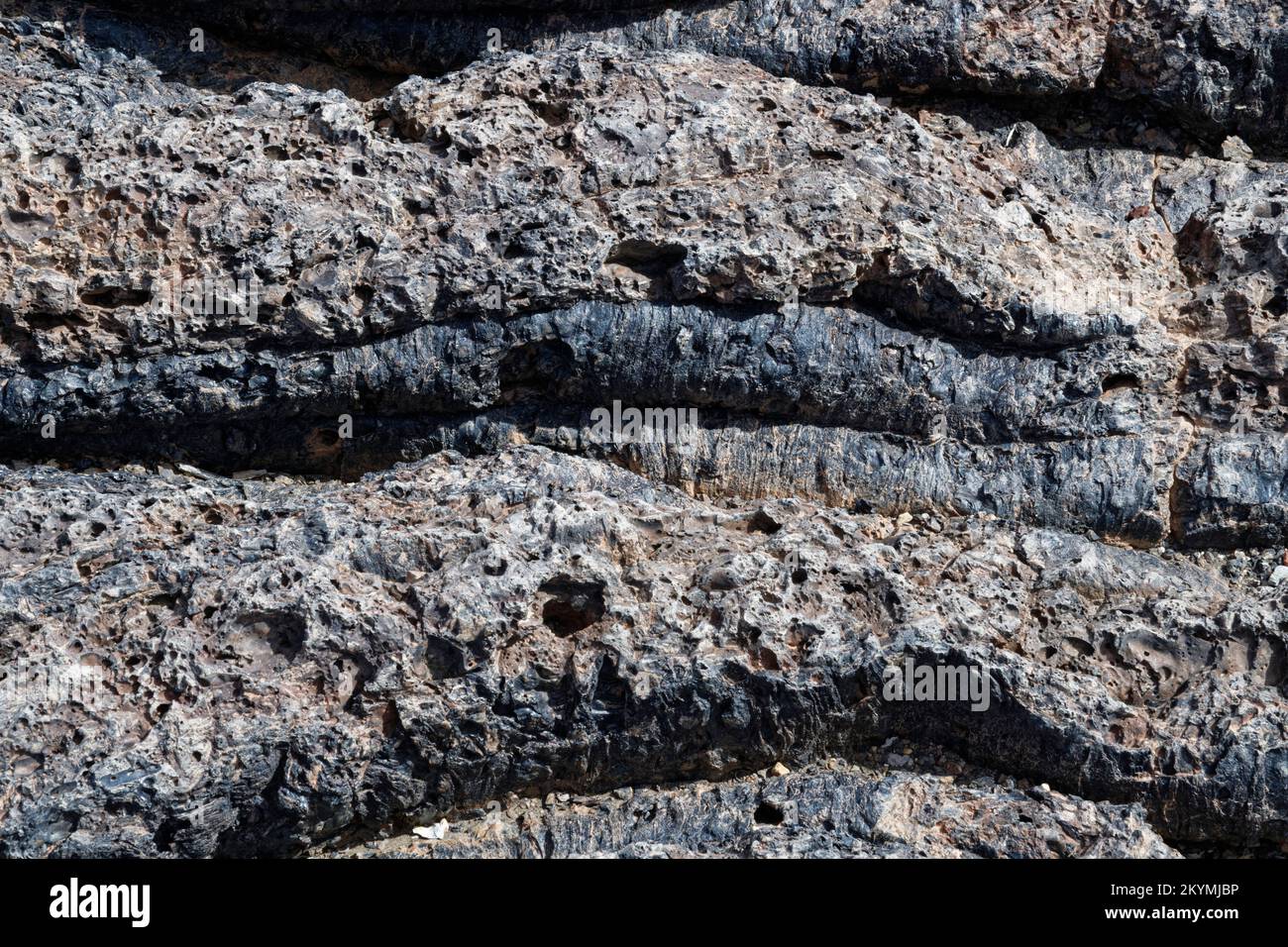 Old, cooled Pahoehoe lava with ropy texture, Teide National Park, Tenerife, Canary Islands, Spain, October. Stock Photo