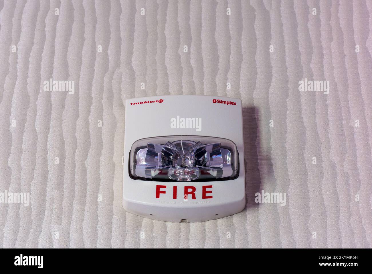 Chandler, AZ - Nov. 25, 2022: This wall mounted, Simplex brand, TrueAlert synchronized strobe fire alarm device is compatible with the Americans with Stock Photo