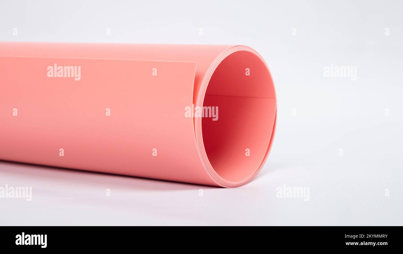 pink roll of gray photo background for photos isolate on white background. Stock Photo