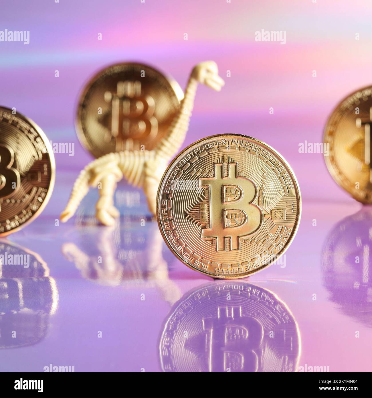 Golden bitcoin coins with dinosaur on neon background. digital currency, business style. Mining and trade bitcoin, evolution concept. square Stock Photo