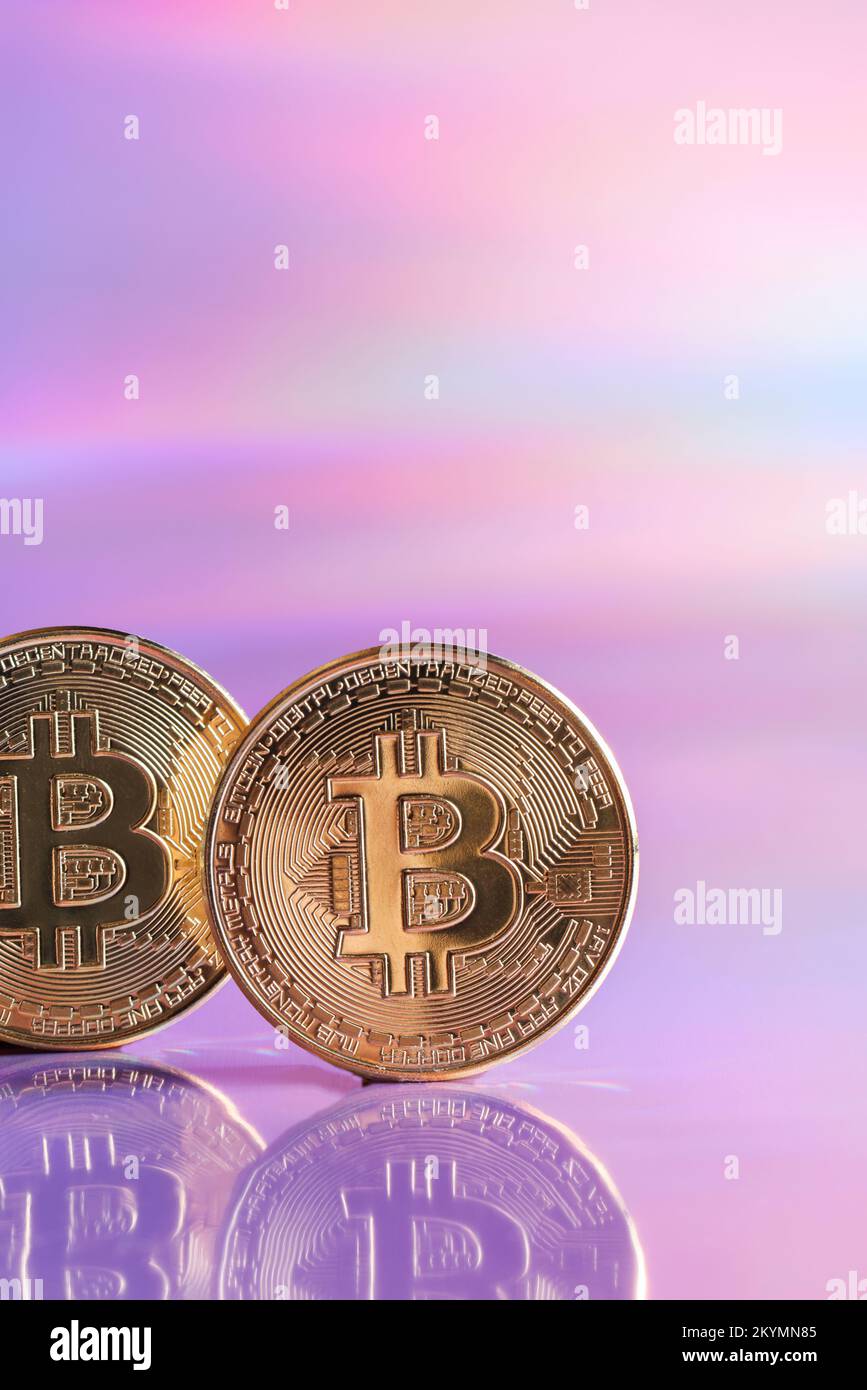 Golden bitcoin coins on holographic, abstract, neon background. digital currency, business style. Mining , trade bitcoin concept. selective focus Stock Photo