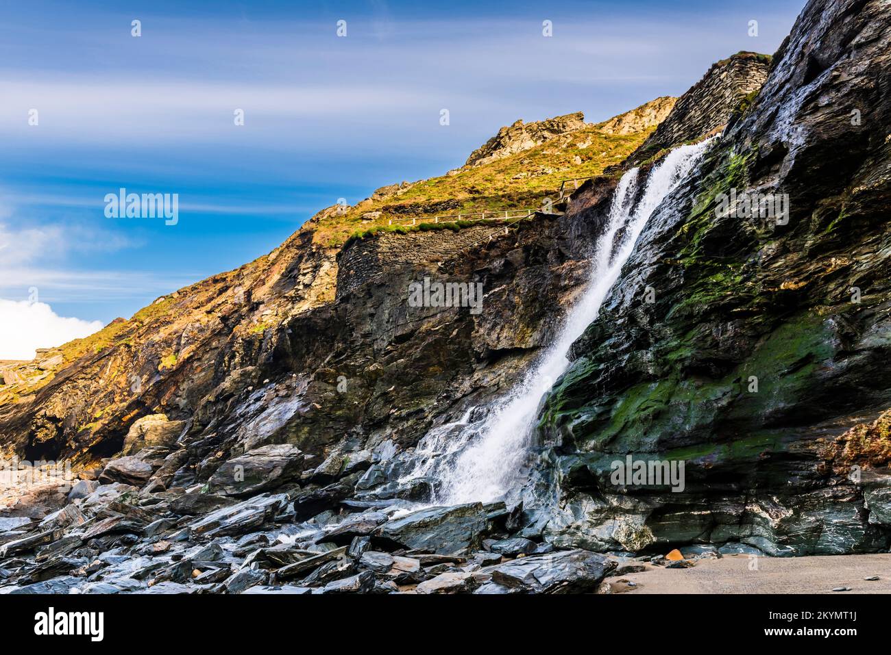 Waterfall on the River Trerammet dropping on to the beach at Tintagel ...