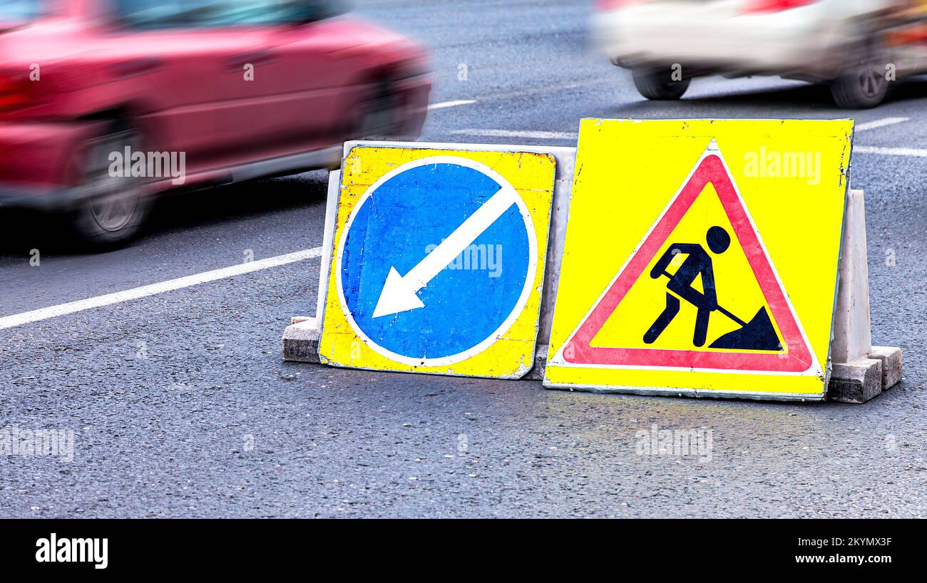 Road sign at the construction site. Keep left road sign at the city street Stock Photo