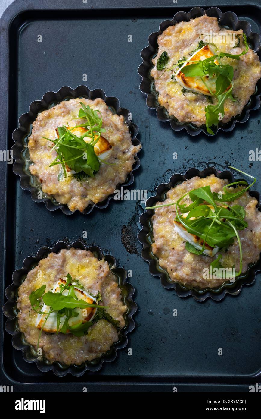 chicken minced meat baked with goat cheese Stock Photo Alamy
