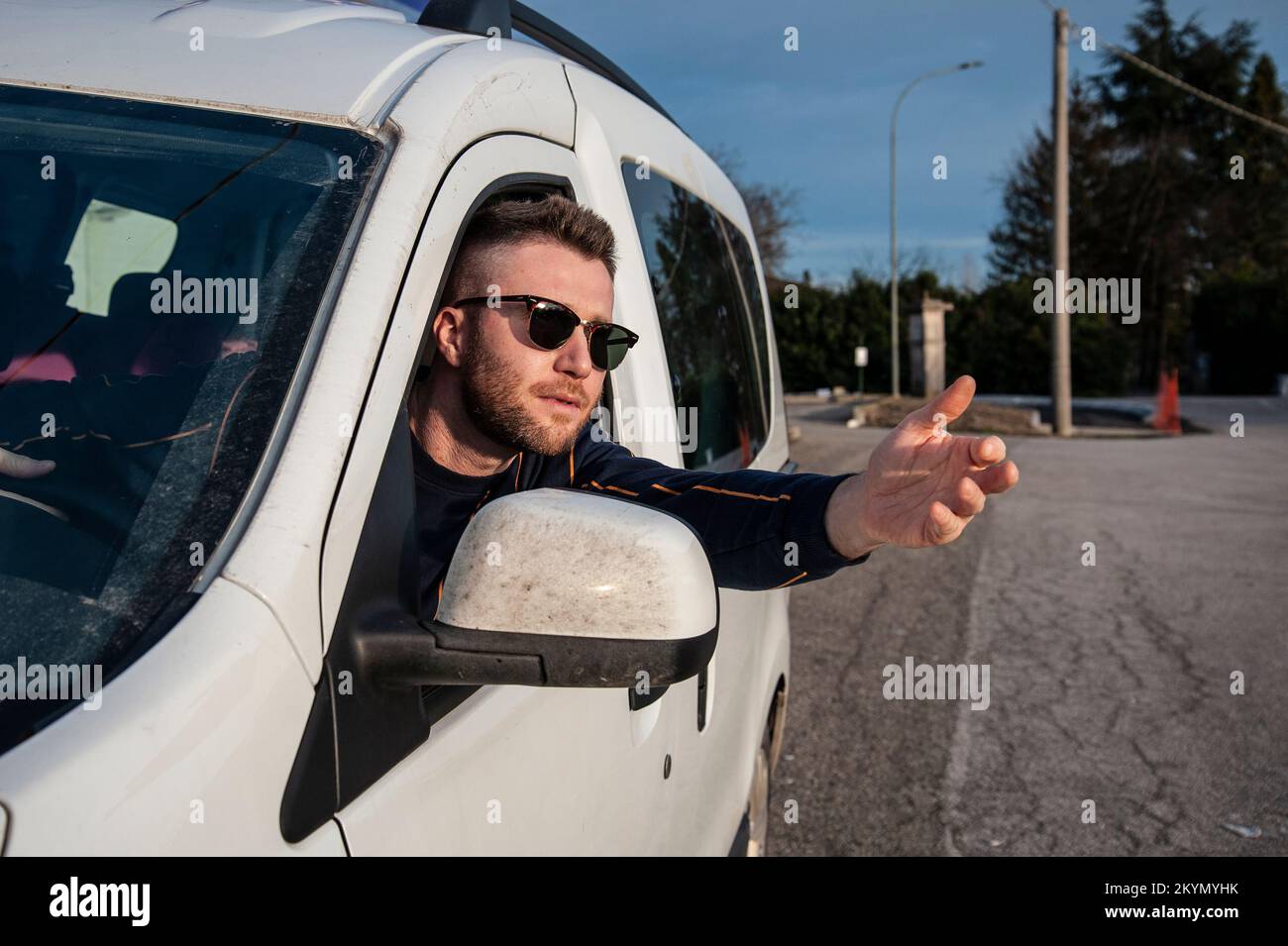 Angry driver while driving on the street Face expression of angry