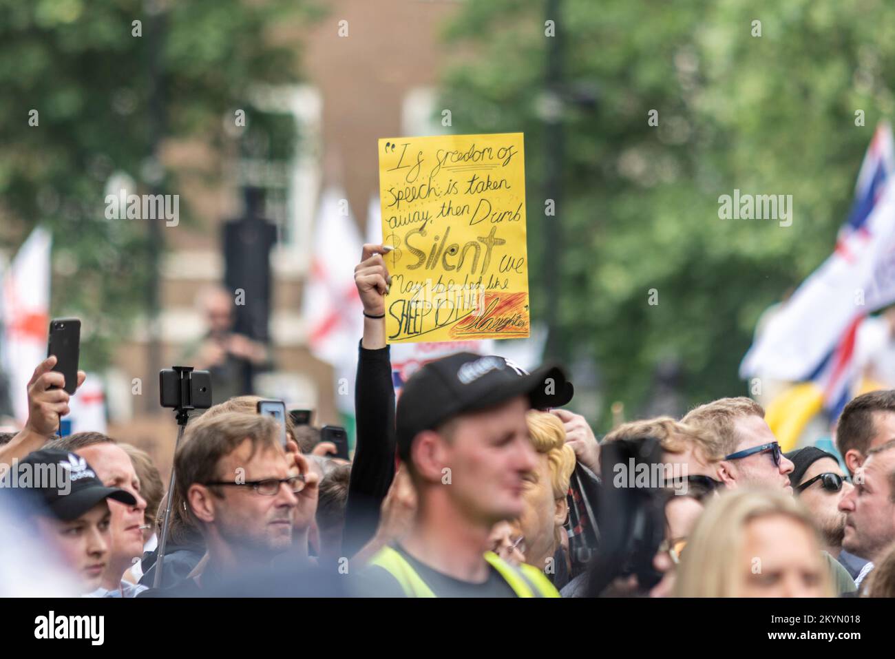 Supporters of Tommy Robinson, such as the EDL, protested in London demonstrating for his release after arrest. Freedom of speech placard Stock Photo