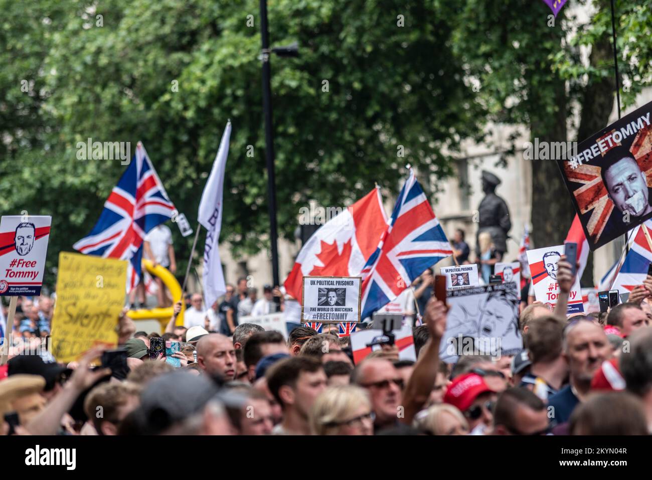 Supporters of Tommy Robinson, such as the EDL, protested in London demonstrating for his release after arrest. Crowds in Whitehall with placards Stock Photo