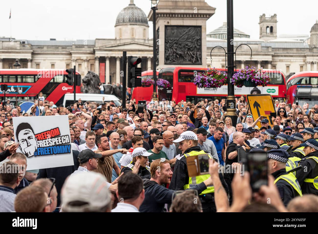 Supporters of Tommy Robinson, such as the EDL, protested in London demonstrating for his release after arrest. Police trying to block from Whitehall Stock Photo