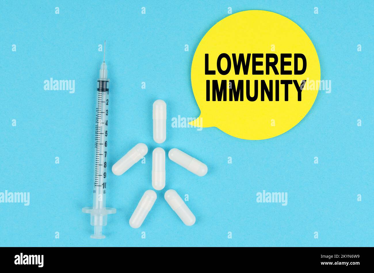 Medicine and health concept. Syringe, human figure made of pills and ...