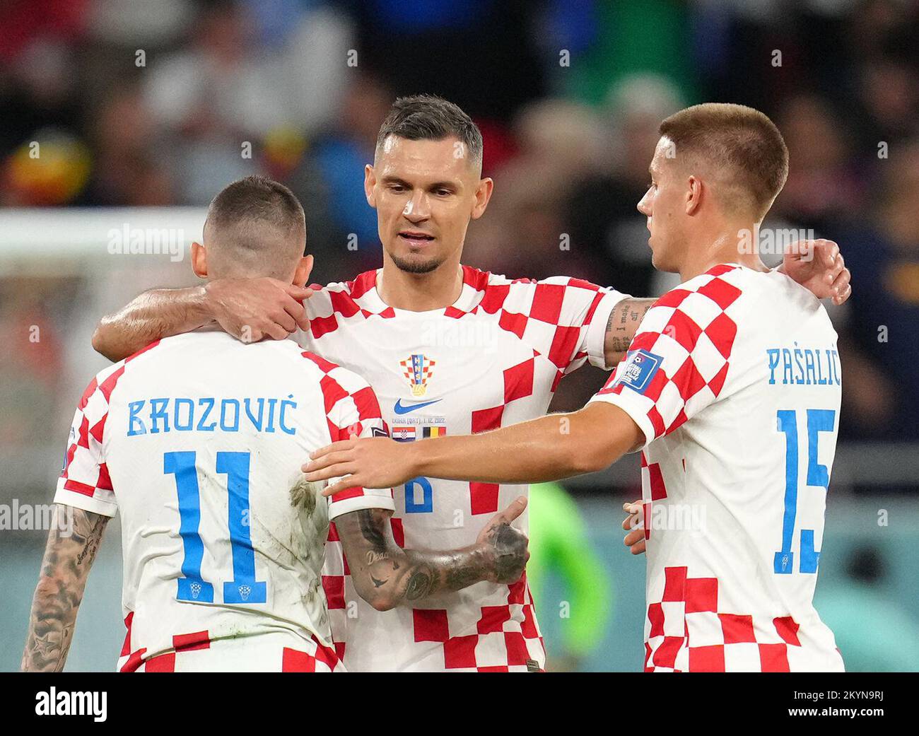 Croatia's Dejan Lovren (centre) after the final whistle with teammates Marcelo Brozovic (left) and Mario Pasalic during the FIFA World Cup Group F match at the Ahmad Bin Ali Stadium, Al Rayyan, Qatar. Picture date: Thursday December 1, 2022. Stock Photo