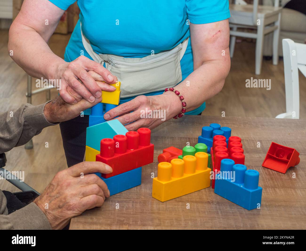 Senior activity concept. Exercises by building spatial figures from ...