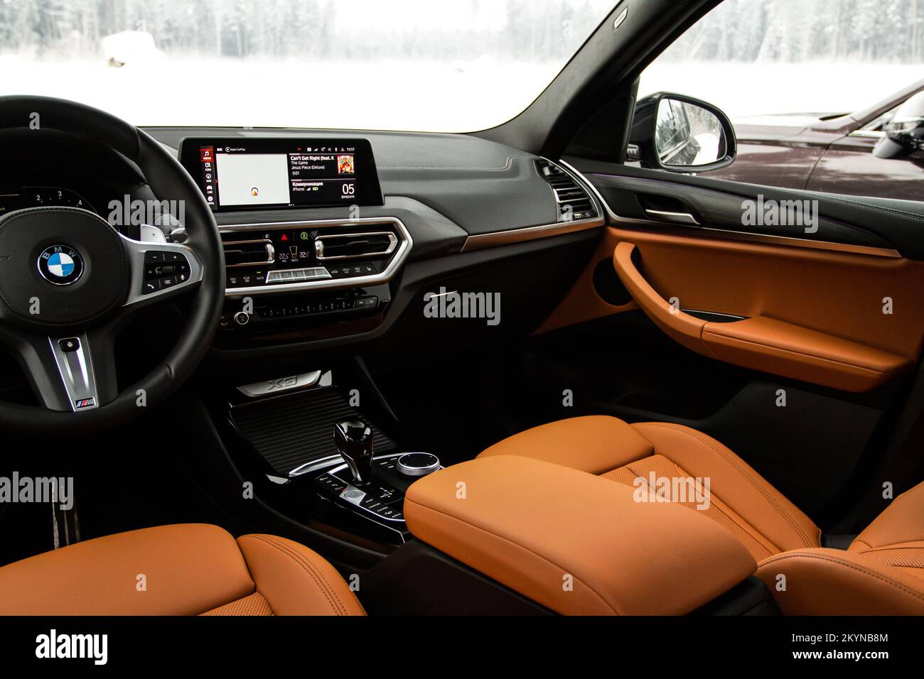 MOSCOW, RUSSIA - FEBRUARY 05, 2022. BMW X3 (G01), interior view. Compact luxury crossover SUV. Central console of the new BMW iDrive. Stock Photo