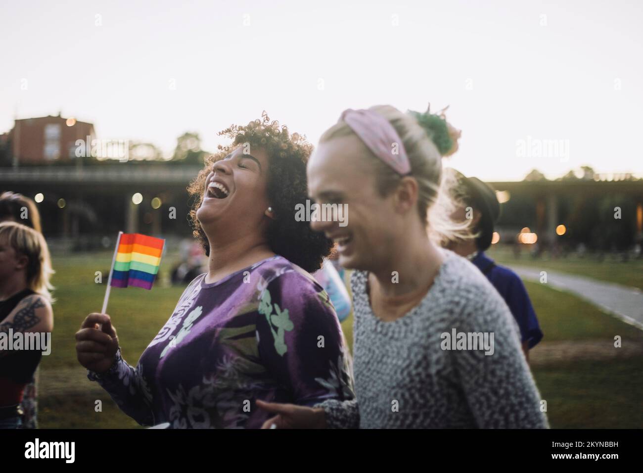 Asian lady wearing blue jean jacket or denim shirt and holding rainbow  color flag, symbol of LGBT pride month celebrate annual in June social of  gay Stock Photo - Alamy