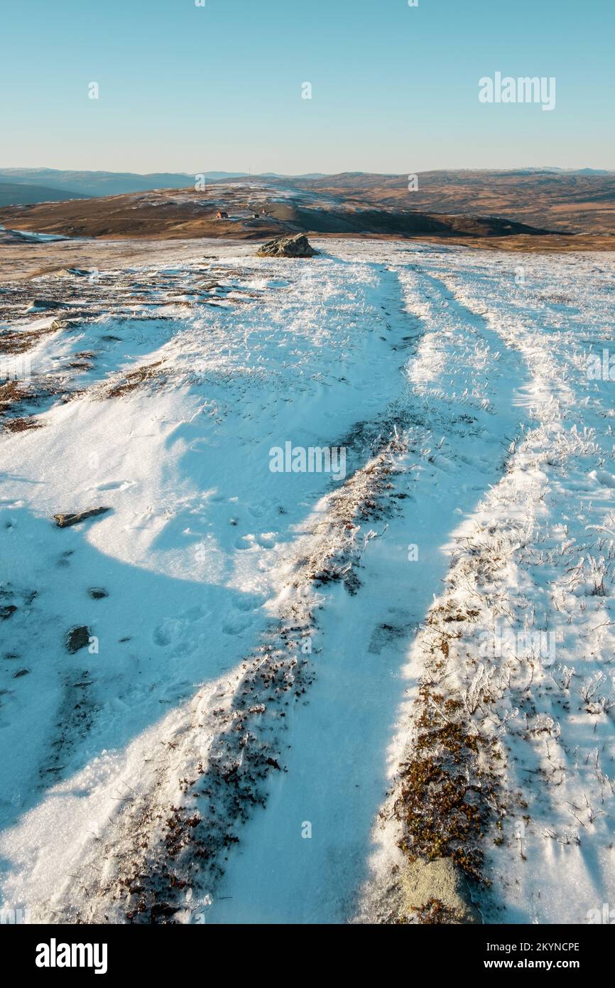 beautiful winter landscape snow view from mountain Litjskarven to Killingdal Gruve in Norway in sunnlight Stock Photo