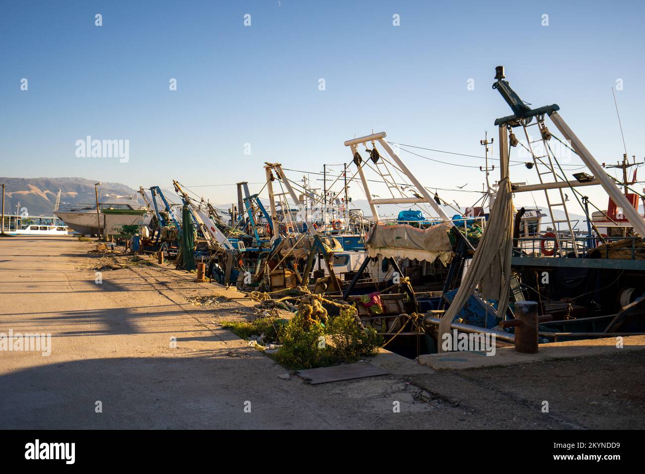Blue fish boat or trawler in the harbor Stock Photo - Alamy