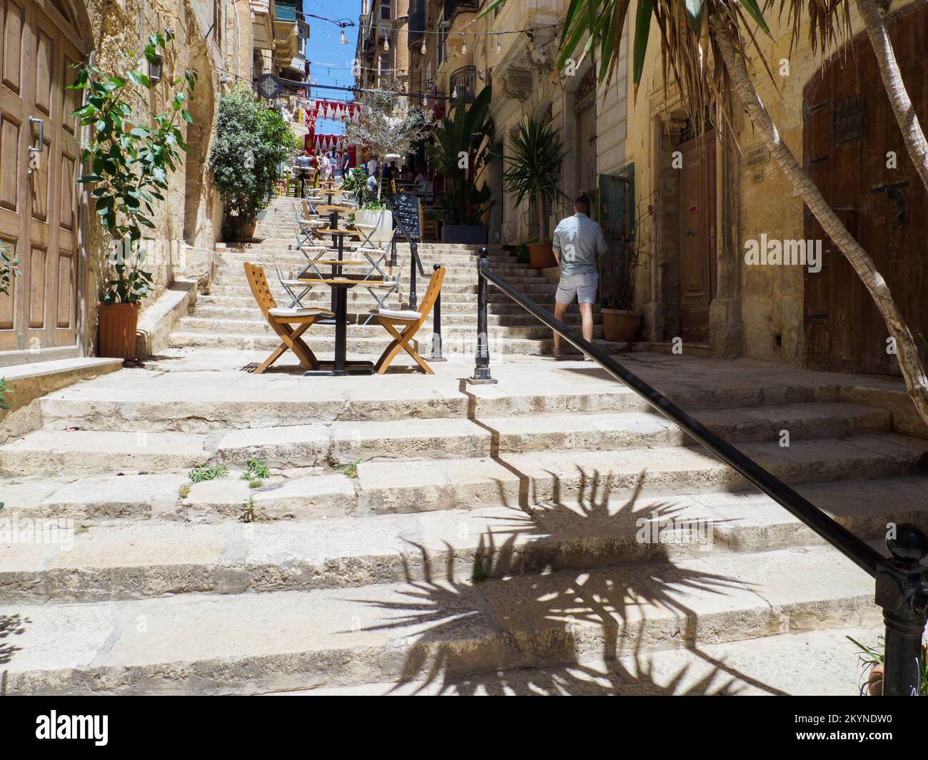 Valletta, Malta May, 2021 Wooden restaurant tables on the steps of a