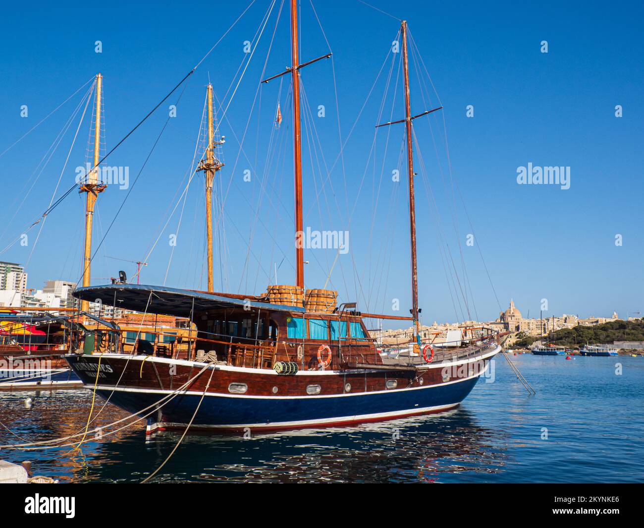 Sliema, Malta - May 2021: A large wooden sailing boat in the harbor in the Sliema district. Malta. Europe Stock Photo