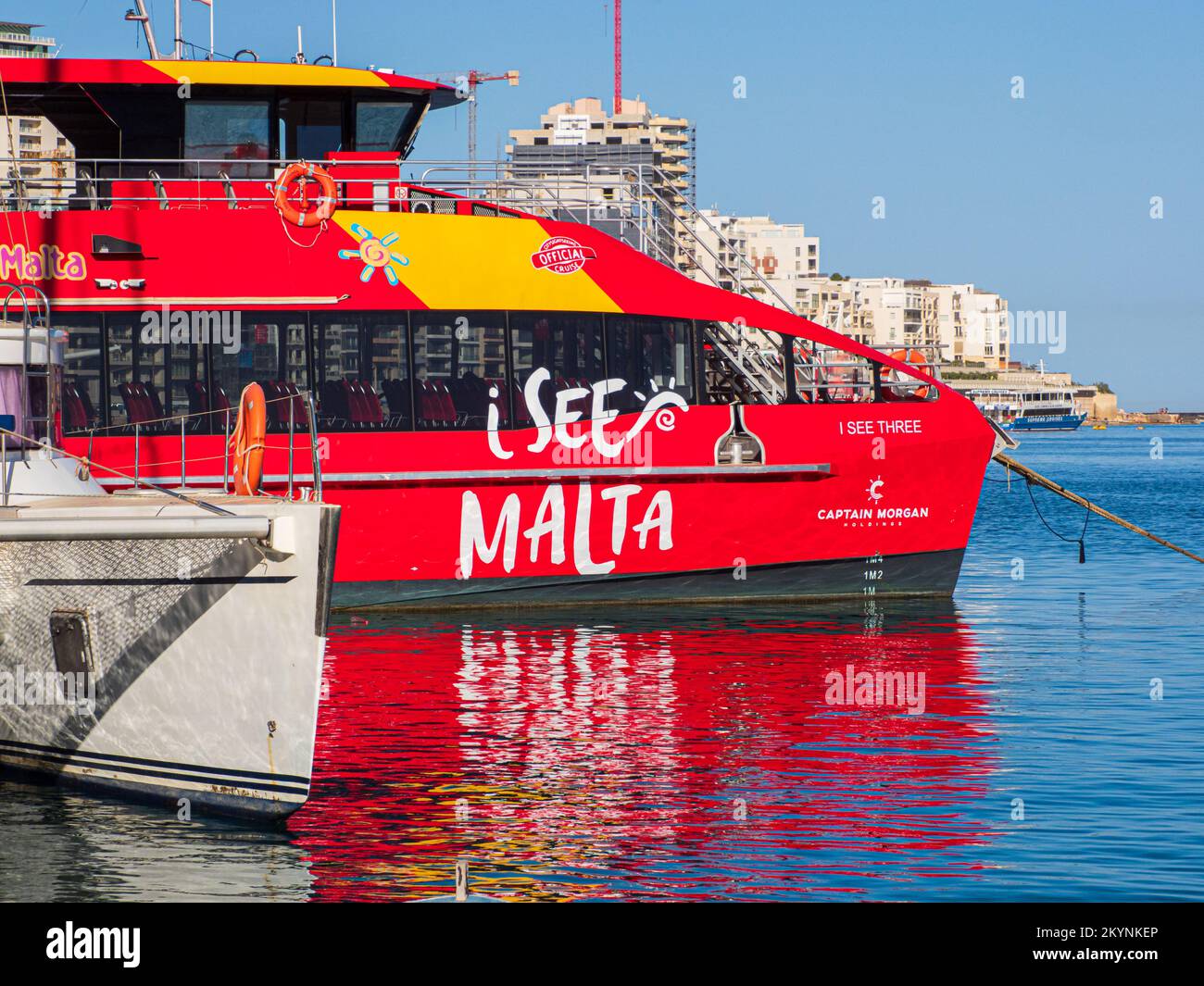 Sliema, Malta - May, 2021: Tuoristic red ship 'hop on hop off' in the port of Sliema district. Sliema Ferry port. Malta. Europe Stock Photo