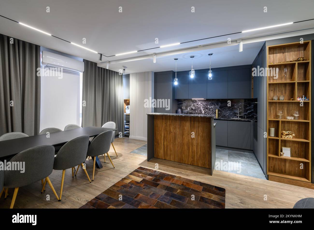 Luxury living room and kitchen in studio apartment Stock Photo - Alamy