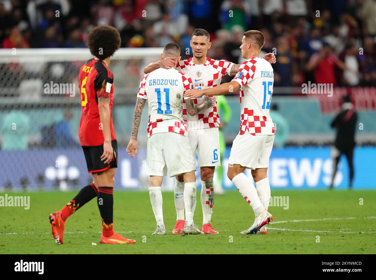 Croatia's Dejan Lovren (centre) after the final whistle with teammates Marcelo Brozovic (left) and Mario Pasalic as Belgium's Axel Witsel walks past during the FIFA World Cup Group F match at the Ahmad Bin Ali Stadium, Al Rayyan, Qatar. Picture date: Thursday December 1, 2022. Stock Photo