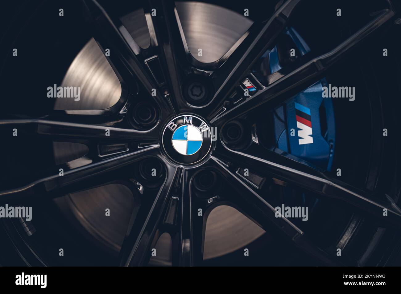 BMW wheel and tire with its logo in a last generation car Stock Photo Alamy