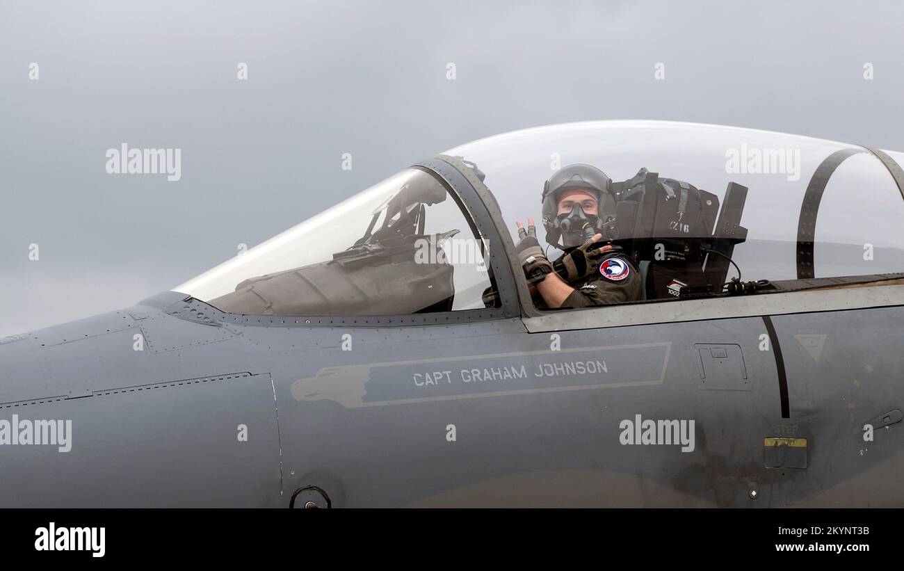 Kadena, Japan. 01st Dec, 2022. A U.S. Air Force F-15C Eagle fighter pilot assigned to the 44th Fighter Squadron, waves before taking off for the final journey home from Kadena Air Base, December 1, 2022 in Okinawa, Japan. The U.S. Air Force is retiring all F-15C/D Eagle aircraft replacing them with next generation advance fighter aircraft. Credit: SrA Moses Taylor/U.S. Air Force/Alamy Live News Stock Photo