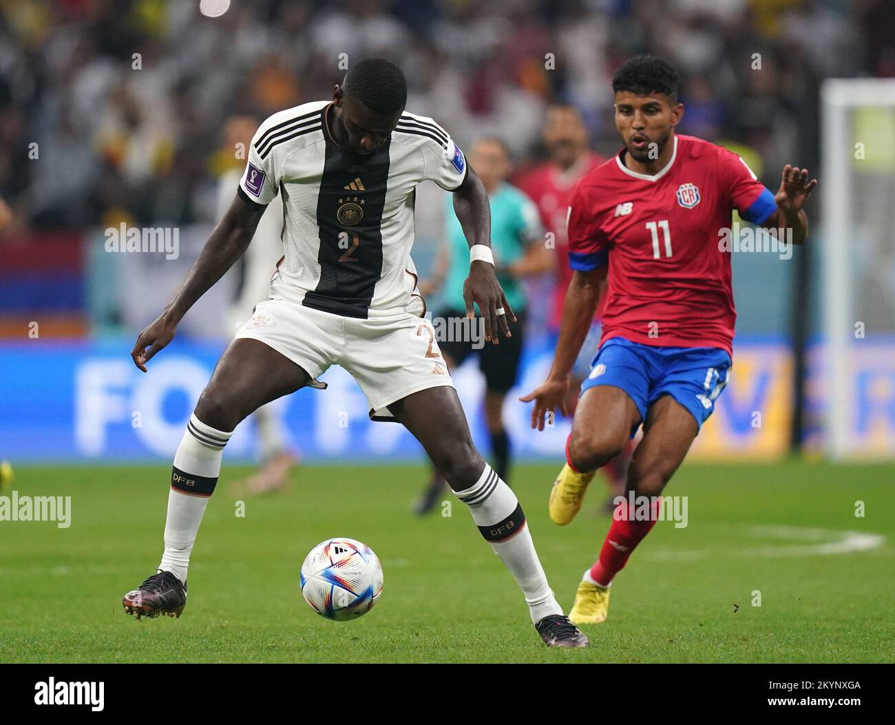 Germany's Antonio Ruediger (left) and Costa Rica's Johan Venegas battle for the ball during the FIFA World Cup Group E match at the Al Bayt Stadium, Al Khor, Qatar. Picture date: Thursday December 1, 2022. Stock Photo