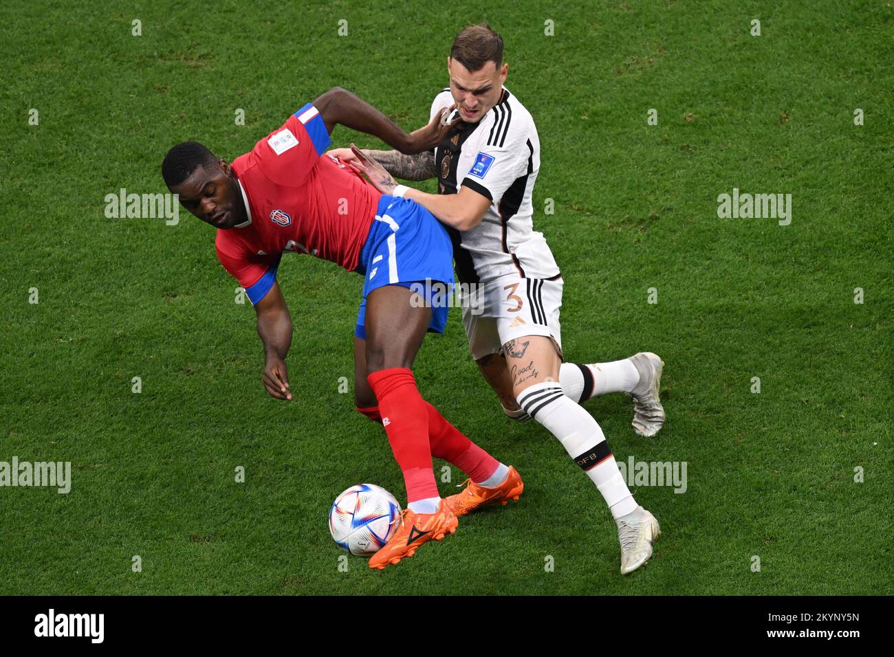 Al Chaur, Qatar. 01st Dec, 2022. Soccer, World Cup 2022 in Qatar, Costa Rica - Germany, preliminary round, Group E, Matchday 3, at Al-Bait Stadium, Costa Rica's Joel Campbell (l) and Germany's David Raum in a duel. Credit: Robert Michael/dpa/Alamy Live News Stock Photo