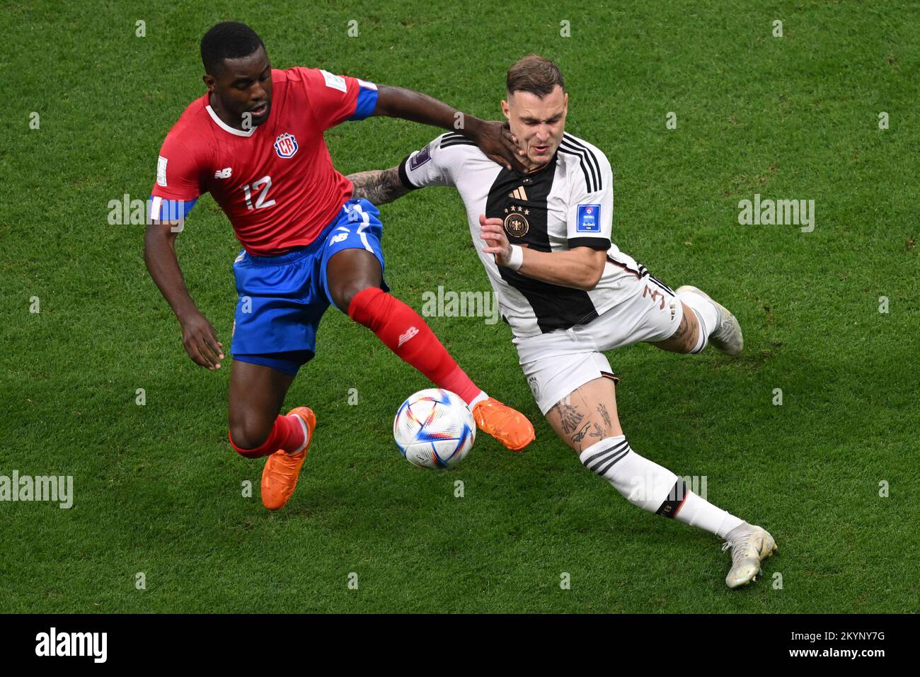 Al Chaur, Qatar. 01st Dec, 2022. Soccer, World Cup 2022 in Qatar, Costa Rica - Germany, preliminary round, Group E, Matchday 3, at Al-Bait Stadium, Costa Rica's Joel Campbell (l) and Germany's David Raum in a duel. Credit: Robert Michael/dpa/Alamy Live News Stock Photo