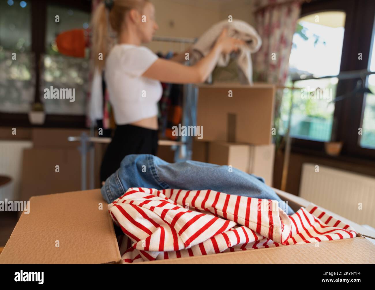 Pre owned clothes resale or donation. Stock Photo