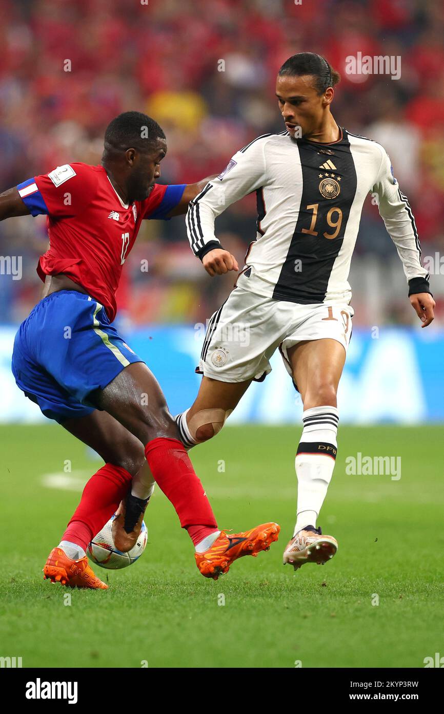 Al Chaur, Qatar. 01st Dec, 2022. Soccer, World Cup 2022 in Qatar, Costa Rica - Germany, preliminary round, Group E, matchday 3, at Al-Bait Stadium, Germany's Leroy Sané and Costa Rica's Joel Campbell in a duel. Credit: Christian Charisius/dpa/Alamy Live News Stock Photo