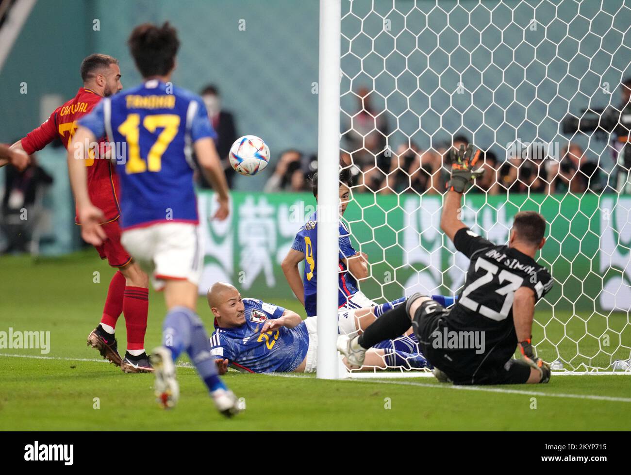 Japan's Kaoru Mitoma crosses the ball to teammate Ao Tanaka who then