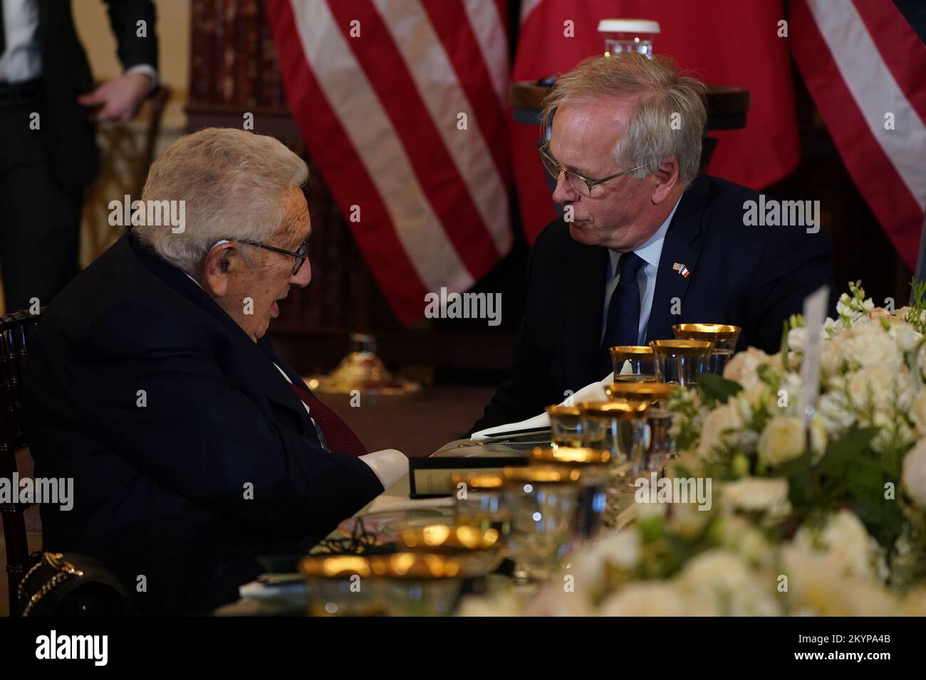 Washington, United States. 01st Dec, 2022. Former United States Secretary of State Henry A. Kissinger (L) converses with Ambassador of France to the United States Philippe Etienne prior to a luncheon hosted by U.S. Secretary of State Antony Blinken honoring President Emmanuel Macron and Brigitte Macron of France at the Department of State in Washington, DC on Thursday, December 1, 2022. Photo by Leigh Vogel/UPI Credit: UPI/Alamy Live News Stock Photo