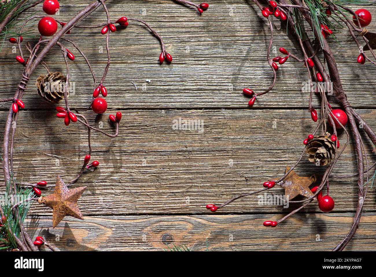 Grape vine traditional Christmas decorations, farmhouse style, on a wooden background, no text Stock Photo