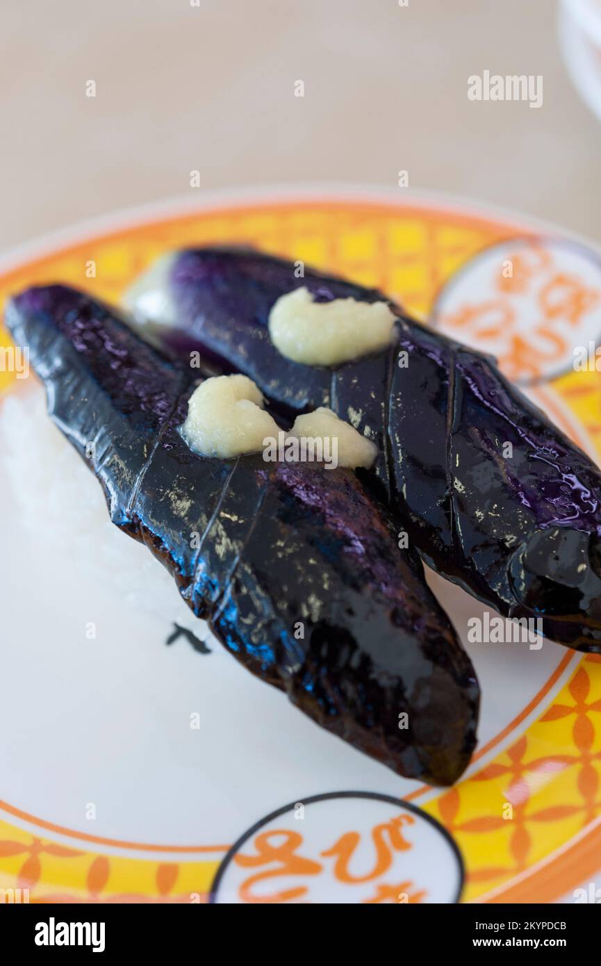 A plate of eggplant sushi, topped with grated ginger, at a “conveyer belt  sushi” restaurant, Kappa Sushi, Japan Stock Photo - Alamy