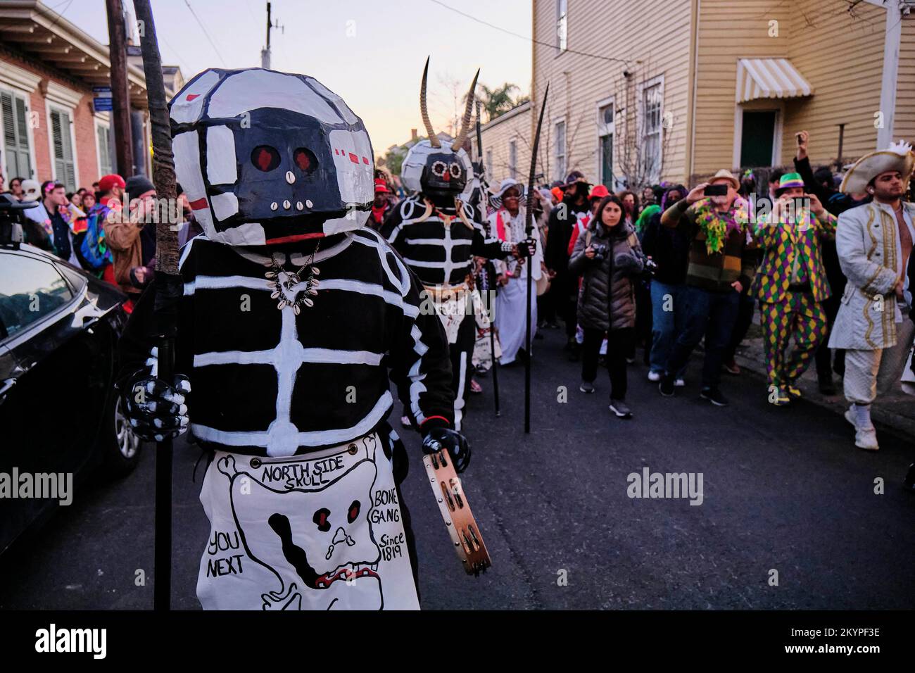 New Orleans, Louisiana, USA. 1st Mar, 2022. The Crowd watches as the North Side Skull and Bone Gang make their Fat Tuesday pre-dawn march through the neighborhood as a part of Mardi Gras celebrations in New Orleans, Louisiana USA on March 01, 2022. The North Side Skull and Bone Gang dates back to the 1800s and sets to remind everyone that death is always close. New Orleans is seeing a return to Mardi Gras celebrations after 2021 saw all parades canceled due to the Covid-19 Pandemic. (Credit Image: © Dan Anderson/ZUMA Press Wire) Stock Photo