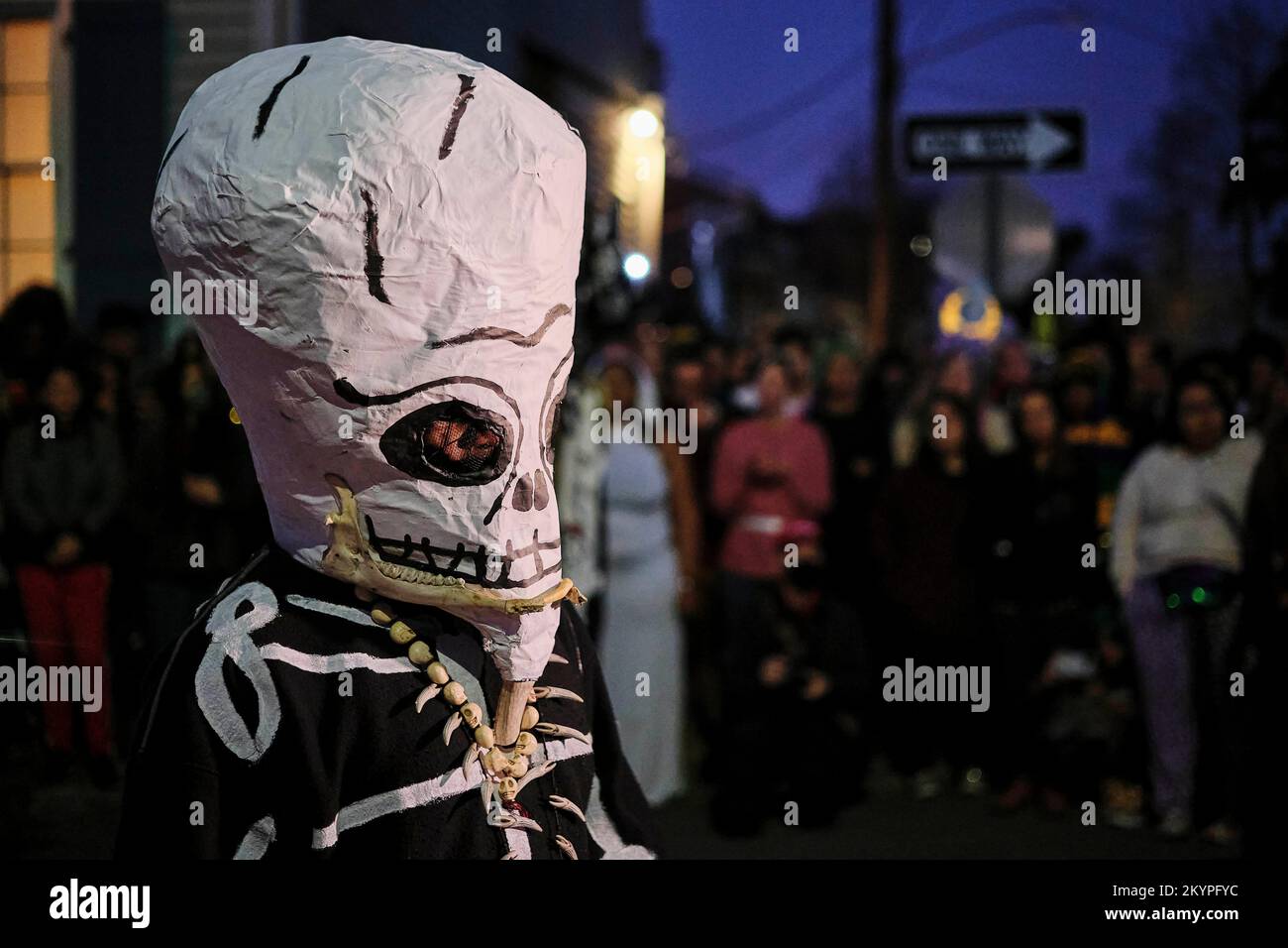 New Orleans, Louisiana, USA. 1st Mar, 2022. The Crowd watches as the North Side Skull and Bone Gang make their Fat Tuesday pre-dawn march through the neighborhood as a part of Mardi Gras celebrations in New Orleans, Louisiana USA on March 01, 2022. The North Side Skull and Bone Gang dates back to the 1800s and sets to remind everyone that death is always close. New Orleans is seeing a return to Mardi Gras celebrations after 2021 saw all parades canceled due to the Covid-19 Pandemic. (Credit Image: © Dan Anderson/ZUMA Press Wire) Stock Photo