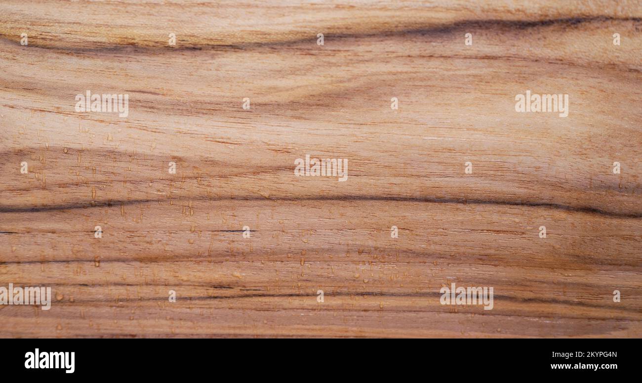 Water drops on wooden surface macro close up view Stock Photo