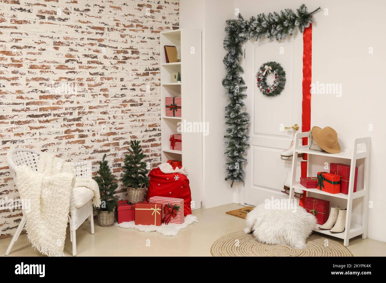 Interior of hall with white door, Christmas wreath and presents Stock ...